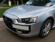 Mitsubishi Lancer X 2008- гг. Рамка для номера (пластик) Черный Матовый фото 1