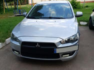 Mitsubishi Lancer X 2008- гг. Рамка для номера (пластик) Черный Матовый фото 3