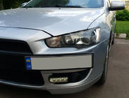 Mitsubishi Lancer X 2008- гг. Рамка для номера (пластик) Черный Матовый фото 2