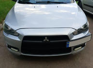 Mitsubishi Lancer X 2008- гг. Рамка для номера (пластик) Черный Матовый фото 4