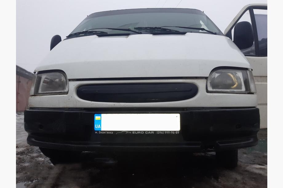 Ford Transit 1991-2000 гг. Зимняя решетка Глянцевая Image