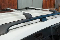 Ford Courier 2014-2023 гг. Багажник поперечины на стандартные рейлинги без замка Flybar V1 (2 шт) фото 2