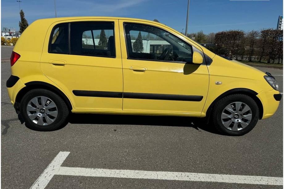 Hyundai Getz 2002- гг. Накладки на арки ABS (4шт, 5D, черные) Image