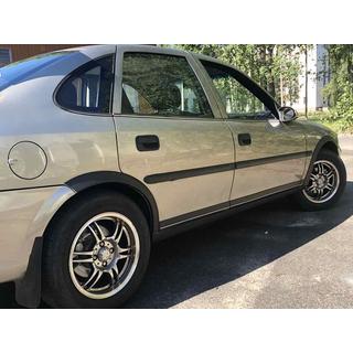 Расширители арок (4 шт, черные) Opel Vectra B 1995-2002 гг. фото 1
