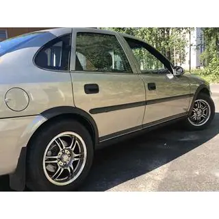 Расширители арок (4 шт, черные) Opel Vectra B 1995-2002 гг. фото 1