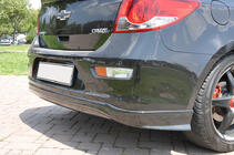 Chevrolet Cruze 2009–2015 гг. Накладка на задний бампер HB (Meliset, грунтованная под покраску) фото 1