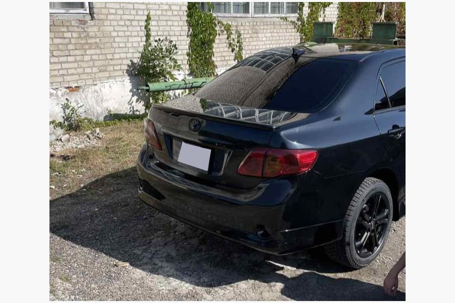 Toyota Corolla 2007-2013 гг. Накладка на задний бампер (грунтованная под покраску) Image