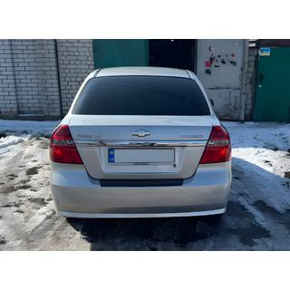 Накладка на задний бампер с загибом Пластик Chevrolet Aveo T250 2005-2011 гг. фото 1