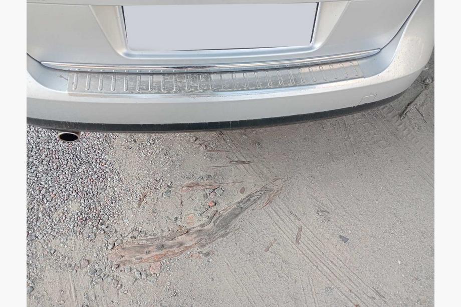 Volkswagen Passat B6 2006-2012 гг. Накладка на задний бампер Carmos (только SW) Image
