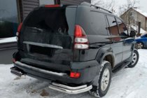 Toyota Land Cruiser Prado 120 2002-2009 гг. Задние двойные уголки AK003-2 (2 шт., нержавейка) фото 1