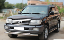 Toyota Land Cruiser 100 1998-2007 гг. Передняя защита ST014 (нержавейка) фото 2