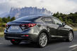 Рестайлинговая версия седана Mazda 3 фото 2