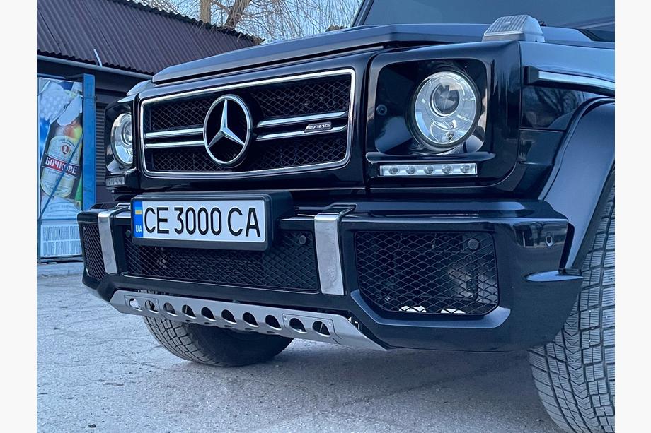Mercedes G class W463 1990-2018 гг. Передний бампер AMG G63/G65 в сборе G65 (черная сетка) Image