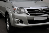 Toyota Hilux 2006-2015 гг. Накладки на фары (2 шт, пластик) фото 1