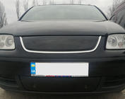 Volkswagen Caddy 2004-2010 гг. Зимняя накладка на решетку LIFE (верхняя) фото 1