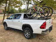 Toyota Hilux 2015- гг. Поперечины на крышу (в штатные места) Черный фото 3