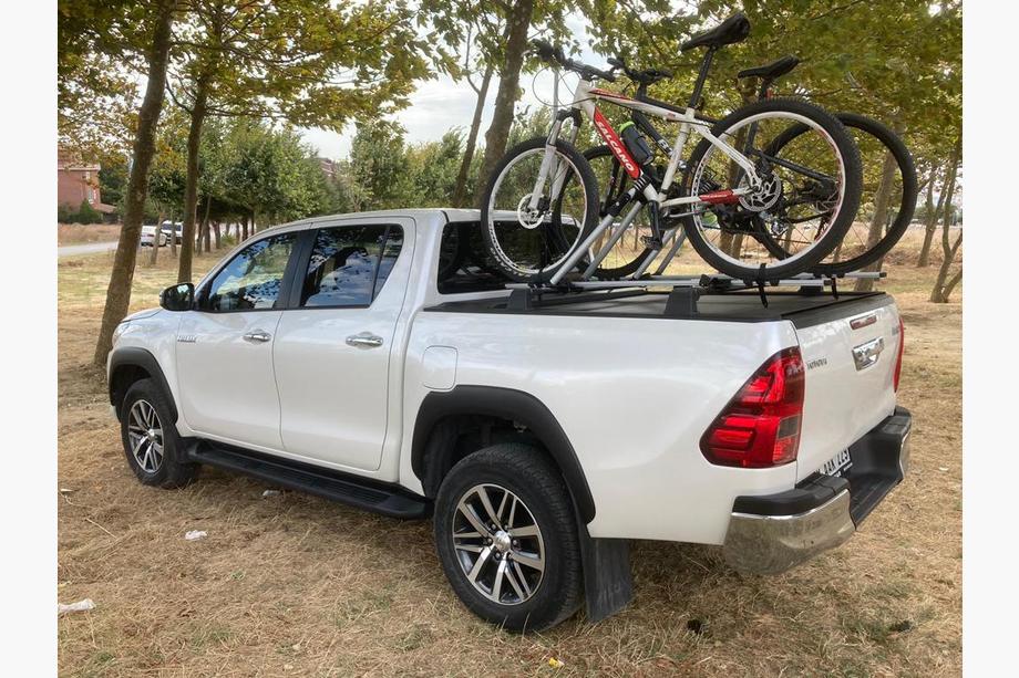 Toyota Hilux 2015- гг. Поперечины на крышу (в штатные места) Серый Фото 3