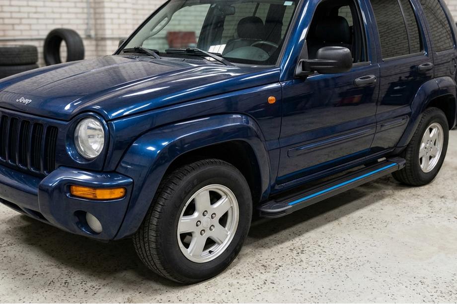 Jeep Cherokee/Liberty 2002-2007 гг. Боковые Подножки Maya Blue (2 шт., Алюминий) Фото 1