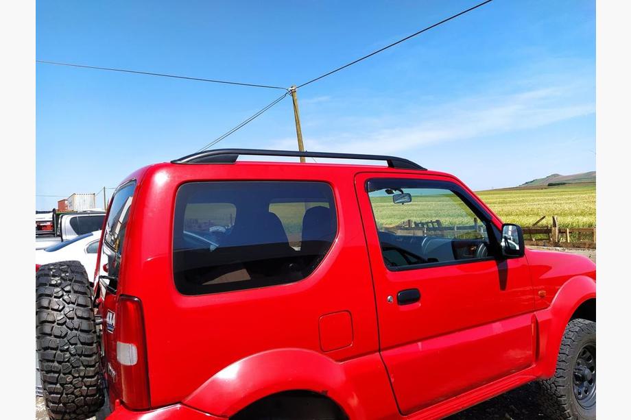 Suzuki Jimny 1998-2018 гг. Рейлинги Skyport (черные) Image