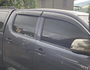 Toyota Hilux 2015- гг. Ветровики с хромированным молдингом (4 шт., Sunplex Chrome) фото 7