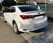 Toyota Corolla 2013-2019 гг. Спойлер Lip (Sunplex, черный) (118см *6,4см) фото 1