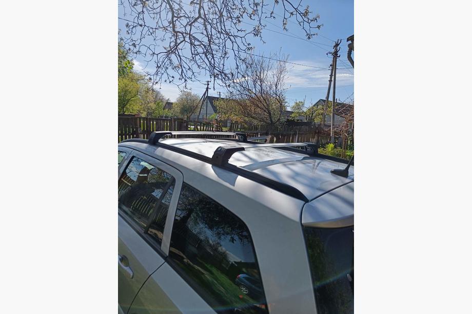 Opel Astra H 2004-2013 гг. Поперечины на интегрированные рейлинги с замком Skybar V2 (2 шт) Фото 2