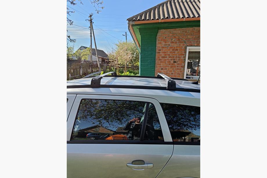 Opel Astra H 2004-2013 гг. Поперечины на интегрированные рейлинги с замком Skybar V2 (2 шт) Фото 12