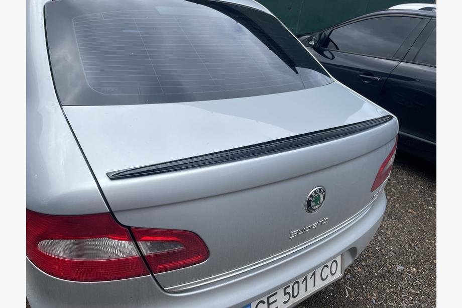 Skoda Superb 2009-2015 гг. Спойлер LIP (Sunplex, черный) (115,8см x 6,3см) Image